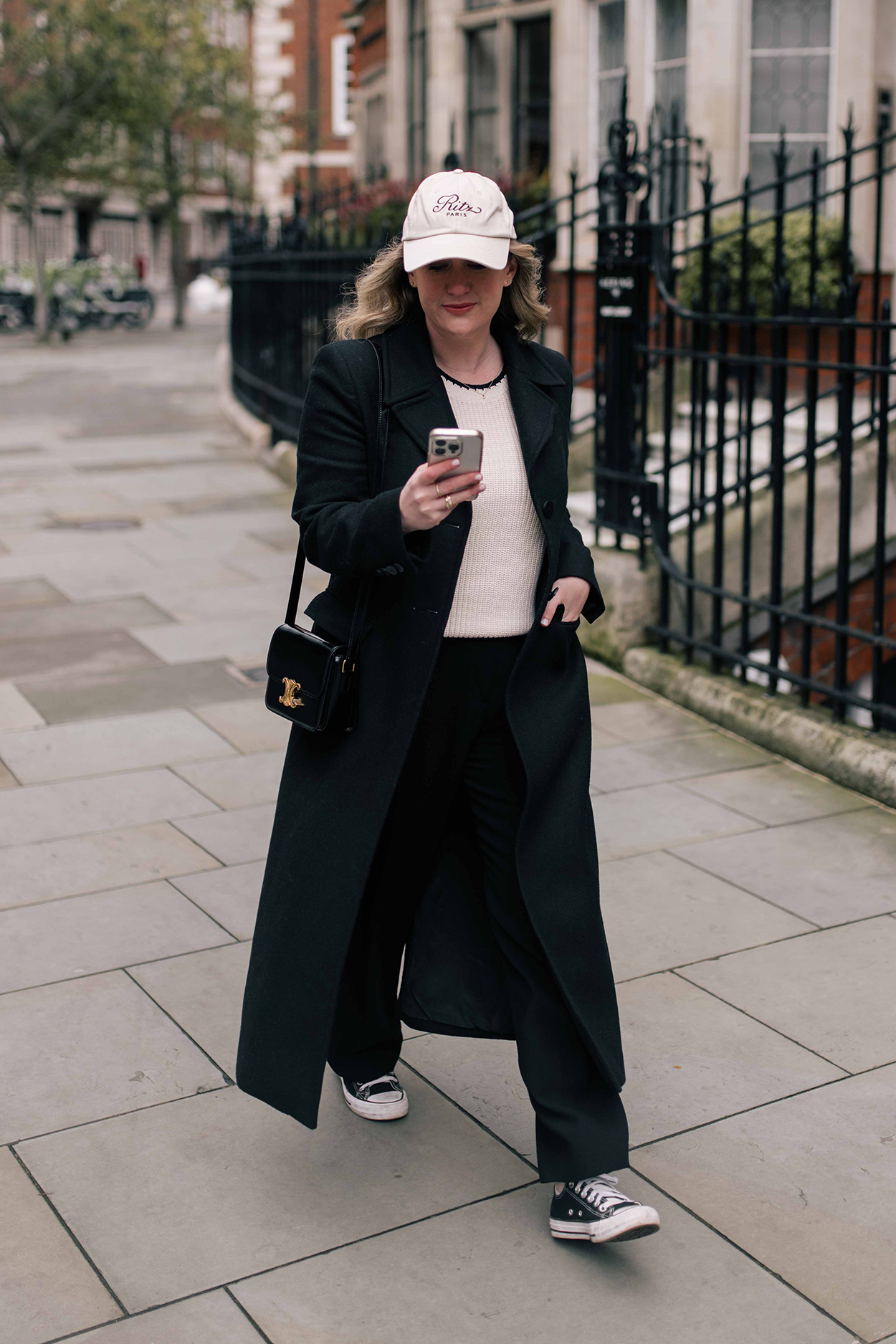 Meghan wearing a Ritz paris baseball cap